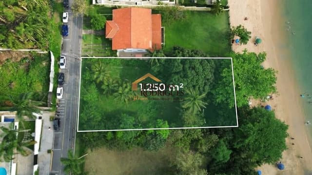 Terreno pé na areia à venda no Condomínio Santa Rita em Ubatuba/SP. — foto 1