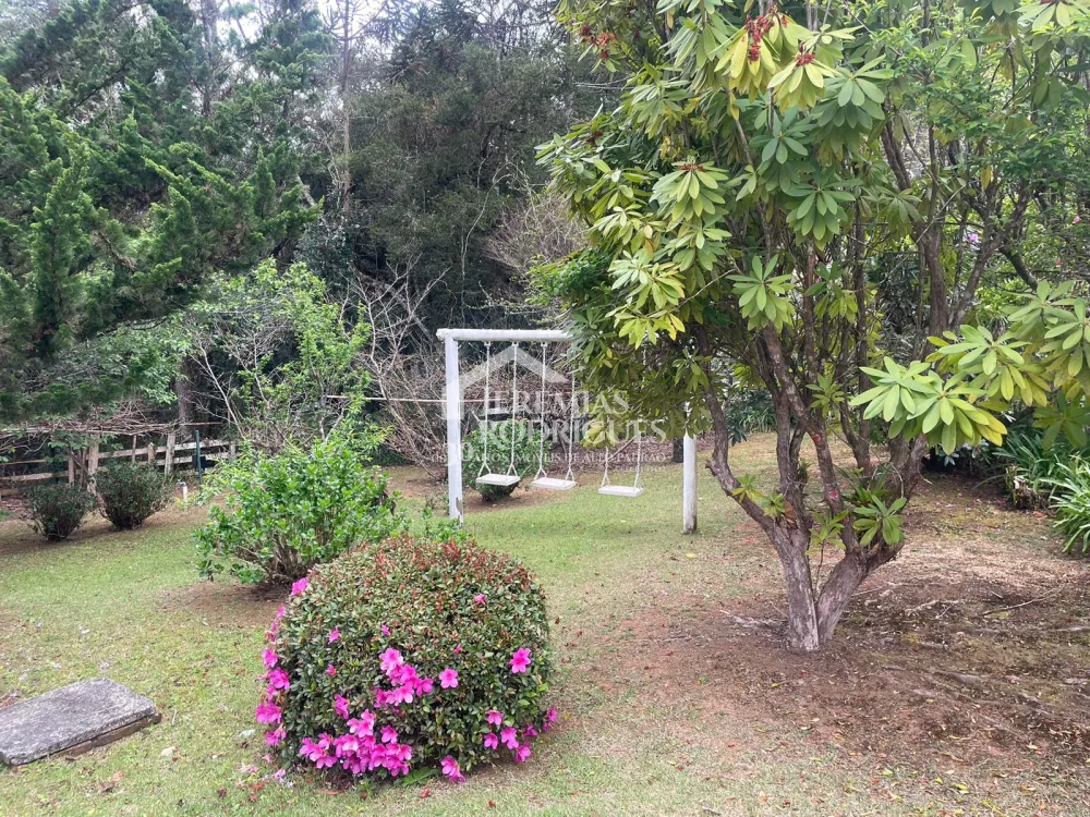 Casa com 6 dormitórios, 362 m² - Condomínio Iporanga, em Campos do Jordão/SP.