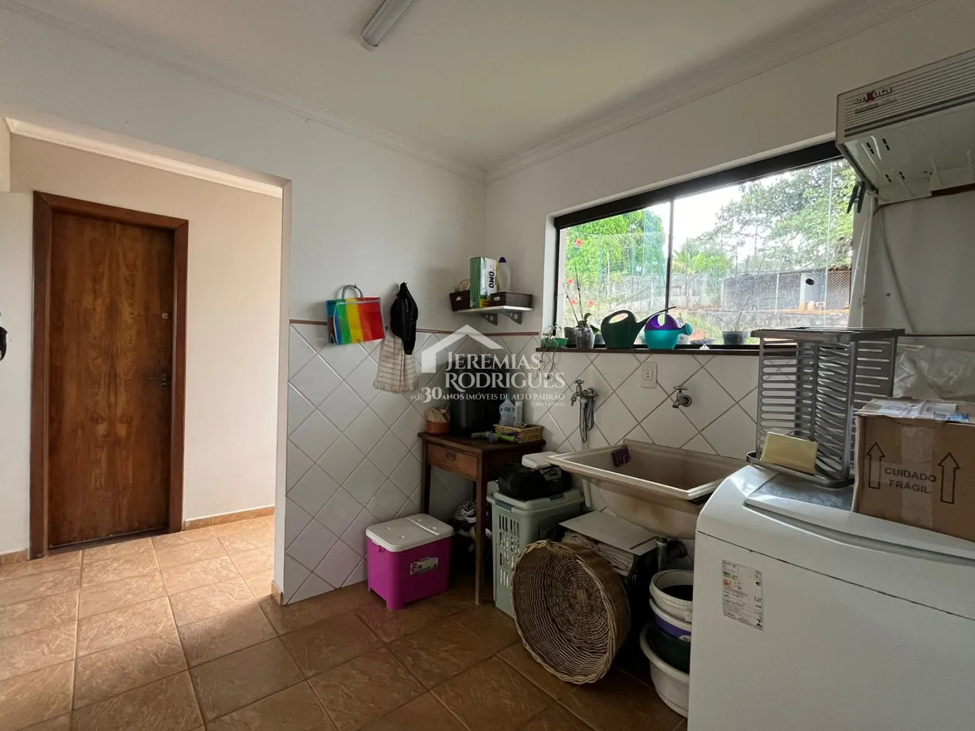 Casa com 4 dormitórios, 421 m² - Condomínio Chácaras Cataguá - Taubaté/SP.