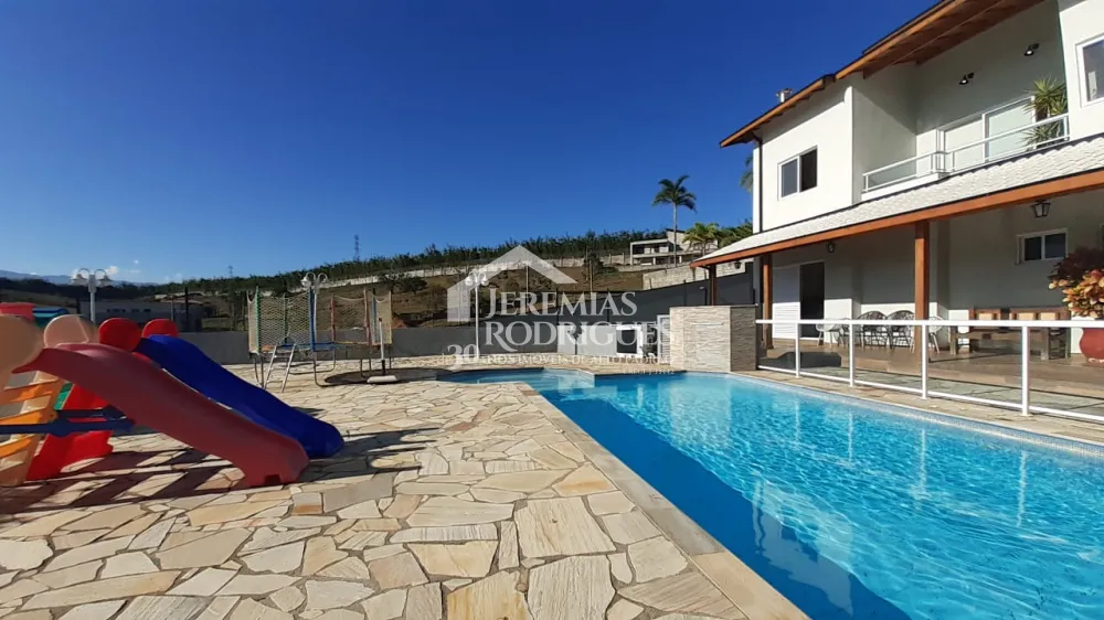 Casa com 5 suítes, 600 m² - Condomínio Village da Serra - Tremembé/SP