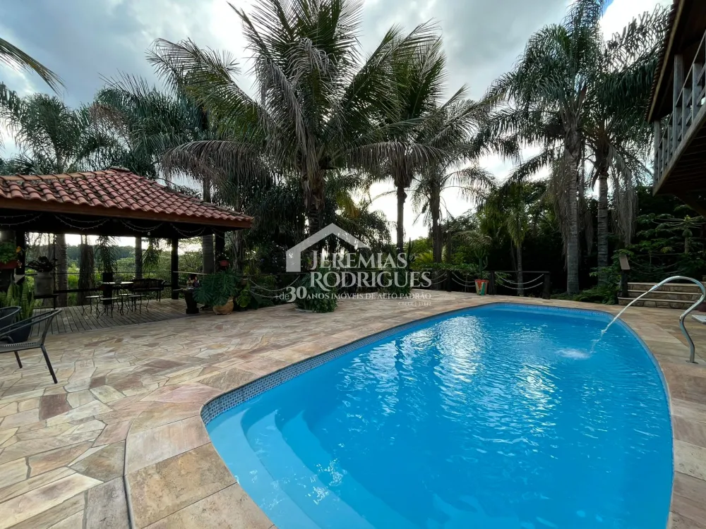 Casa com 4 dormitórios, 360 m² - Condomínio Chácaras Cataguá- Taubaté/SP