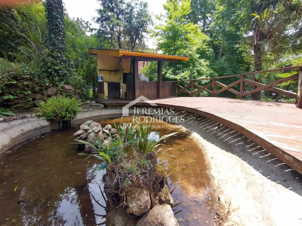 Casa com 4 dormitórios, 380 m² - Condomínio Jardim Véu da Noiva - Campos do Jordão/SP