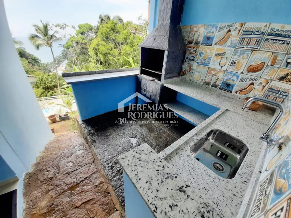 Casa com 5 suítes, 450 m² - Condomínio Ponta das Toninhas - Ubatuba/SP