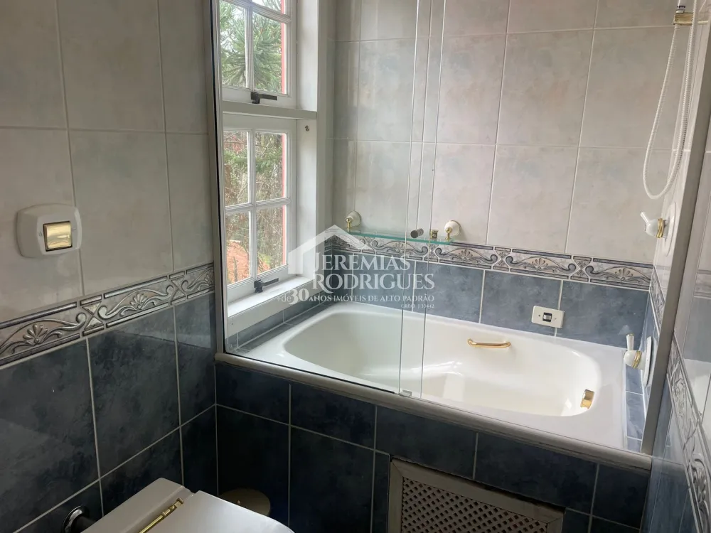 Casa com 6 dormitórios, 362 m² - Condomínio Iporanga, em Campos do Jordão/SP.