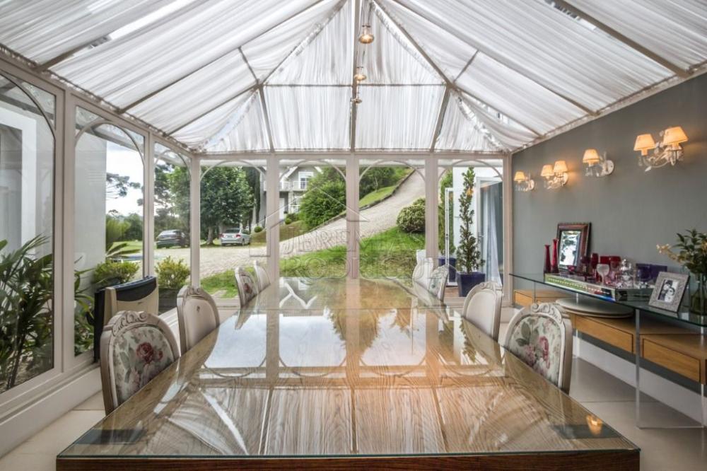 Casa à venda com 7 dormitórios no bairro Recanto das Araucárias em Campos do Jordão/SP.