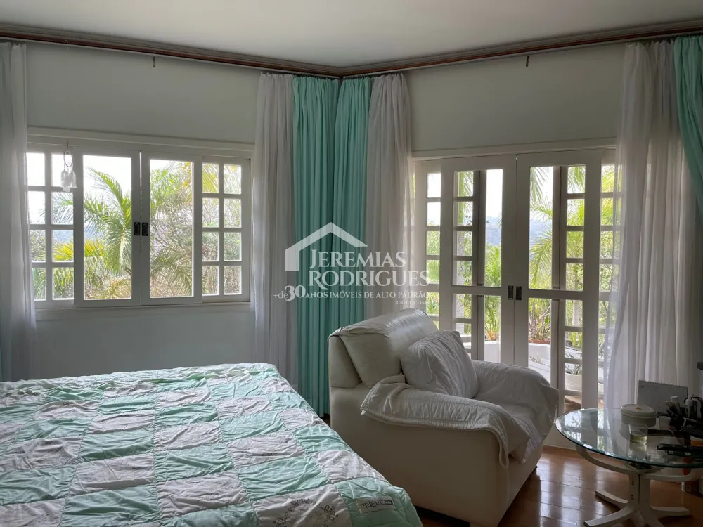 Casa com 6 suítes, 575 m² - Condomínio Quinta das Flores - São José dos Campos/SP.