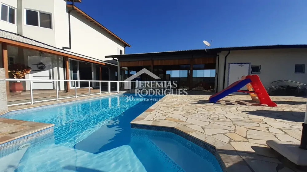 Casa com 5 suítes, 600 m² - Condomínio Village da Serra - Tremembé/SP