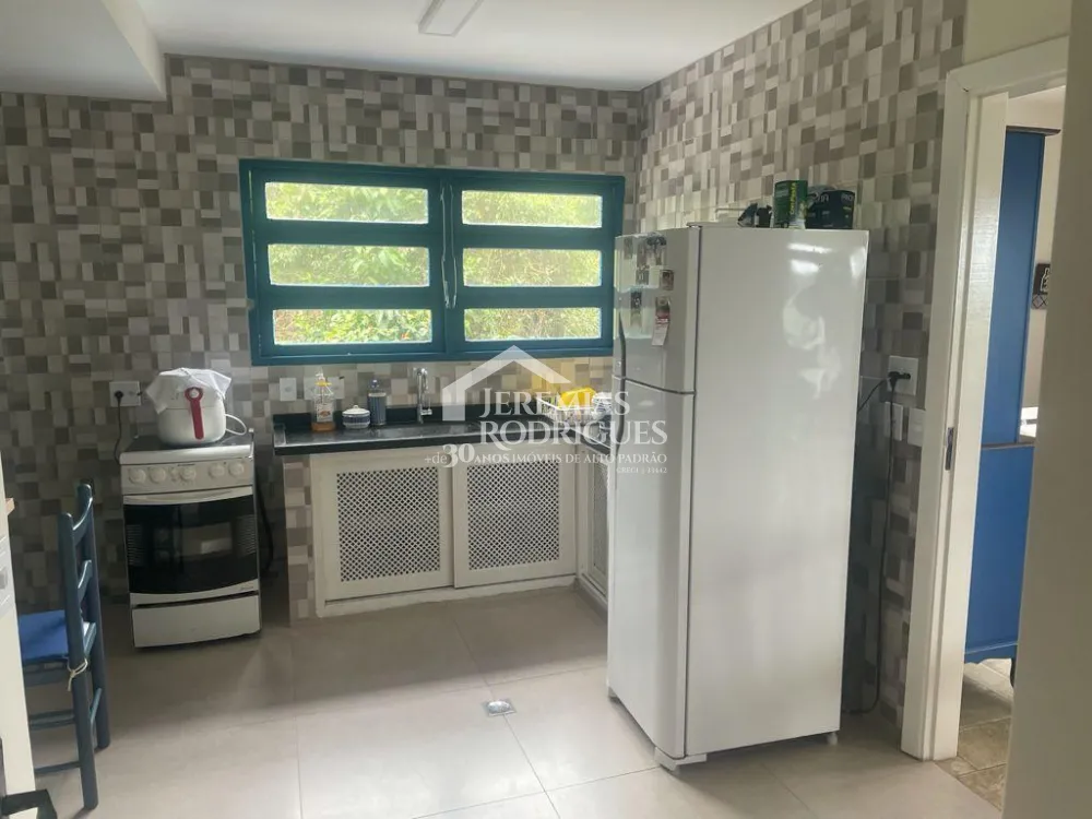 Casa com 5 suítes, 450 m² - Condomínio Ponta das Toninhas - Ubatuba/SP