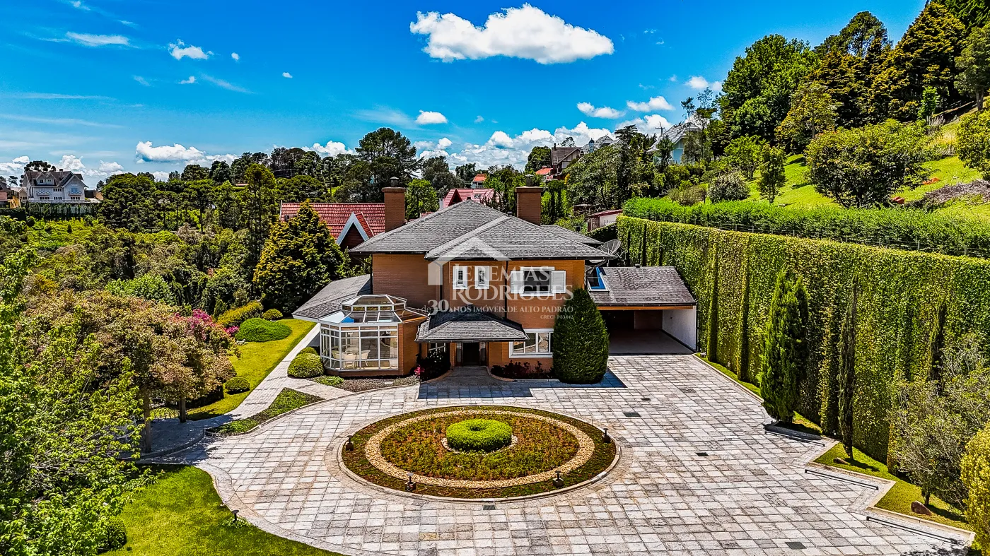 Casa com 4 suítes, 670 m² - Alto do Capivari - Campos do Jordão/SP.