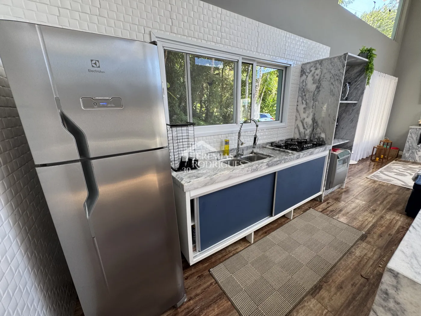 Casa à venda com 3 suítes no Condomínio Capitanias em Ubatuba/SP.