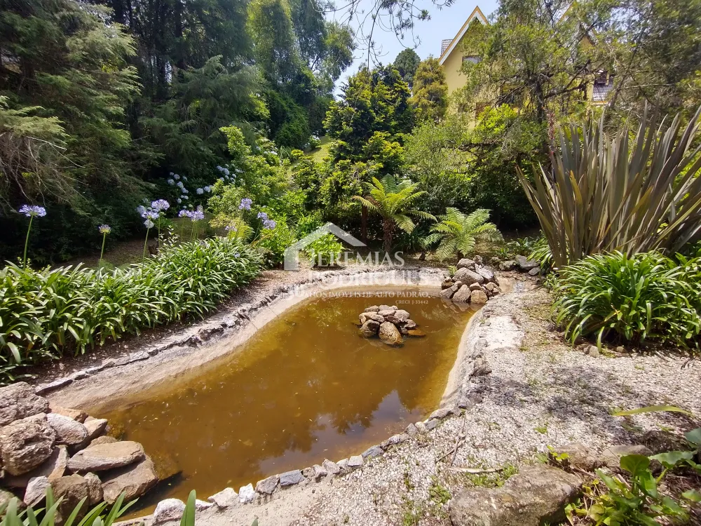 Casa com 4 dormitórios, 380 m² - Condomínio Jardim Véu da Noiva - Campos do Jordão/SP