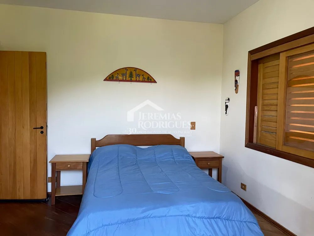 Casa com 3 suítes, 332 m² - Condomínio Florestal Clube - Campos do Jordão/SP.