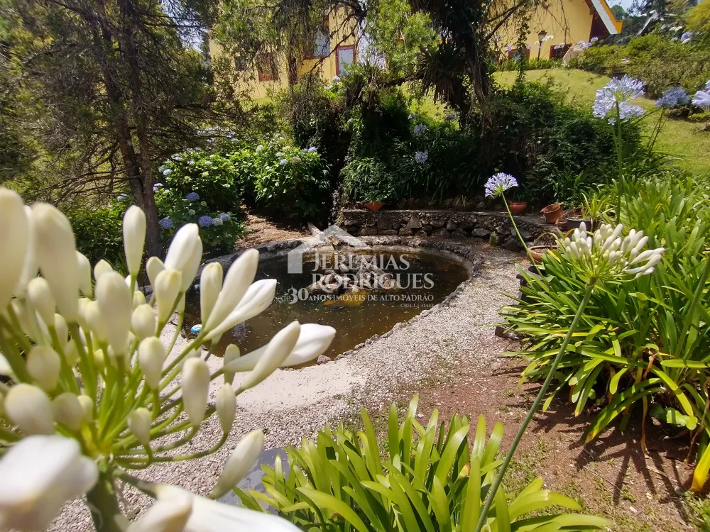 Casa com 4 dormitórios, 380 m² - Condomínio Jardim Véu da Noiva - Campos do Jordão/SP