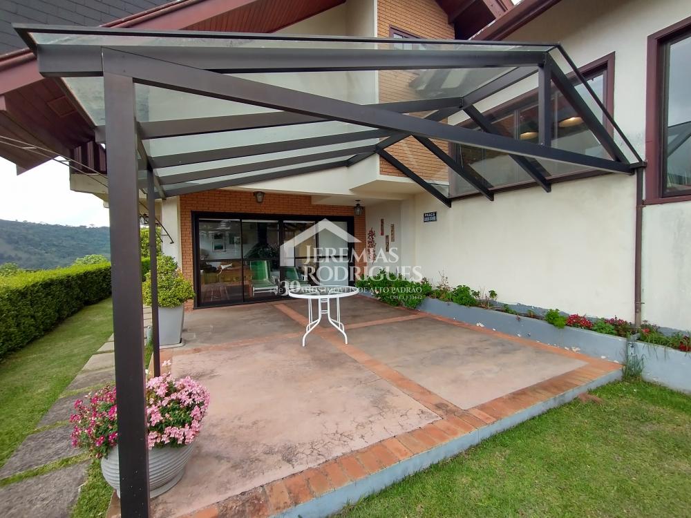 Casa com 4 dormitórios, 281 m² - Condomínio Jardim Véu da Noiva - Campos do Jordão/SP