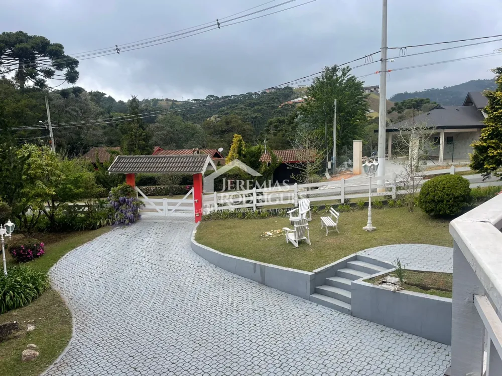 Casa com 6 dormitórios, 362 m² - Condomínio Iporanga, em Campos do Jordão/SP.