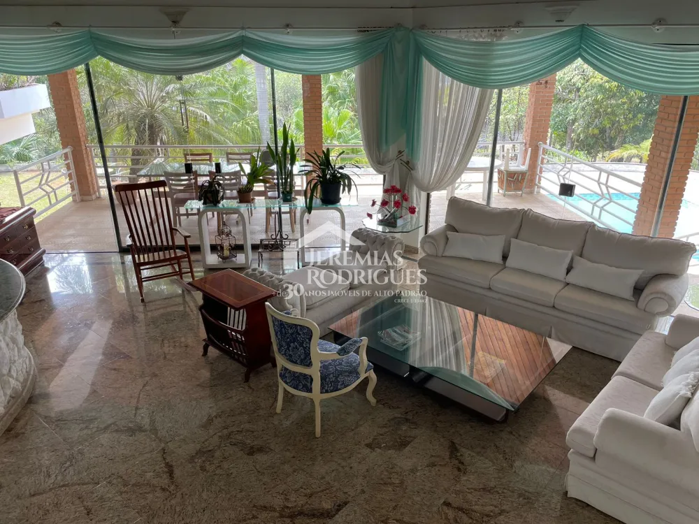 Casa com 6 suítes, 575 m² - Condomínio Quinta das Flores - São José dos Campos/SP.