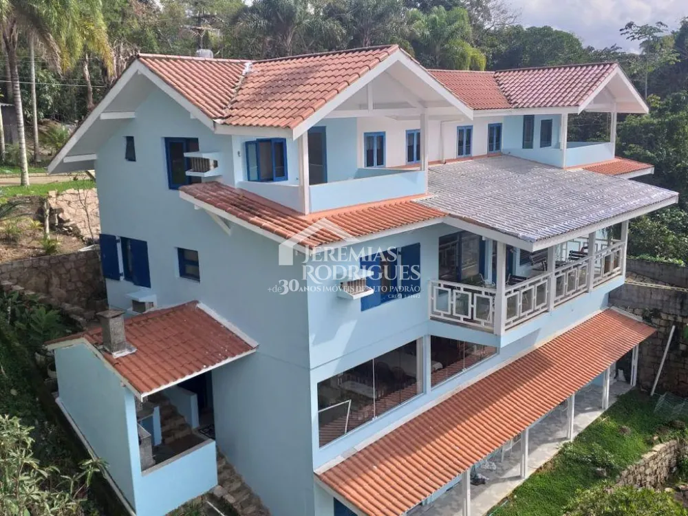 Casa com 5 suítes, 450 m² - Condomínio Ponta das Toninhas - Ubatuba/SP