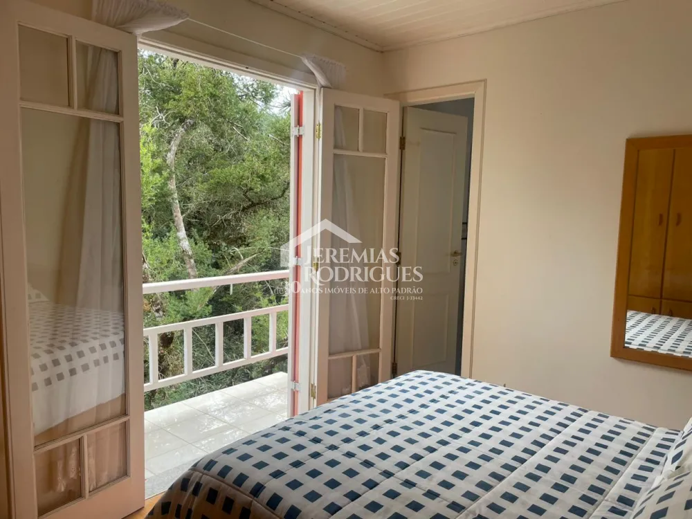 Casa com 6 dormitórios, 362 m² - Condomínio Iporanga, em Campos do Jordão/SP.