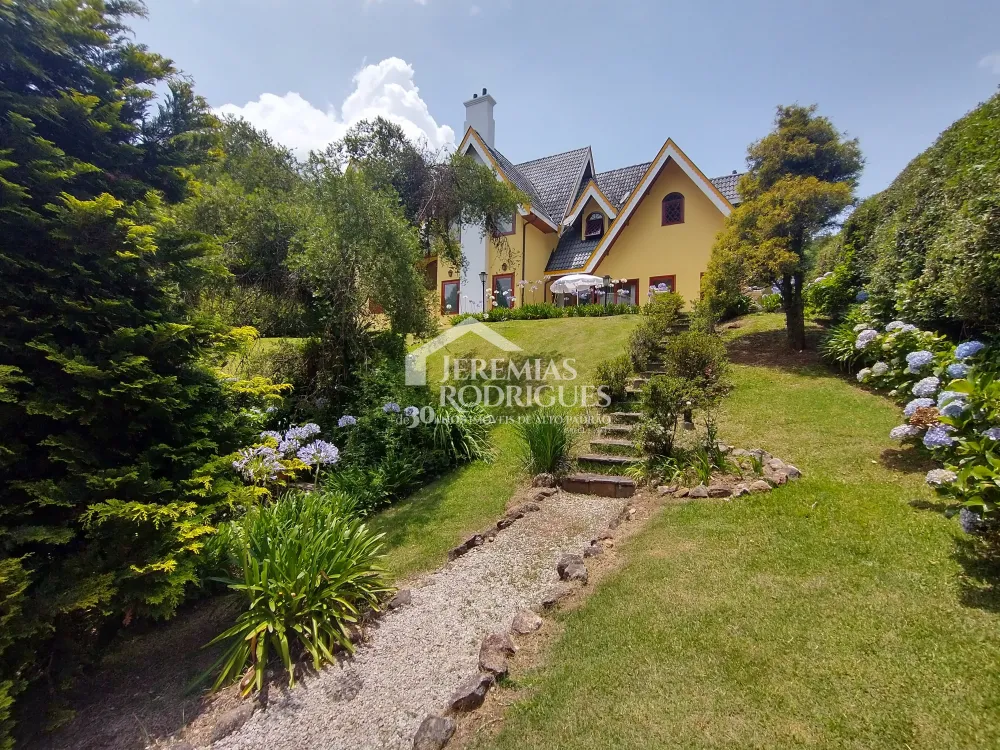 Casa com 4 dormitórios, 380 m² - Condomínio Jardim Véu da Noiva - Campos do Jordão/SP