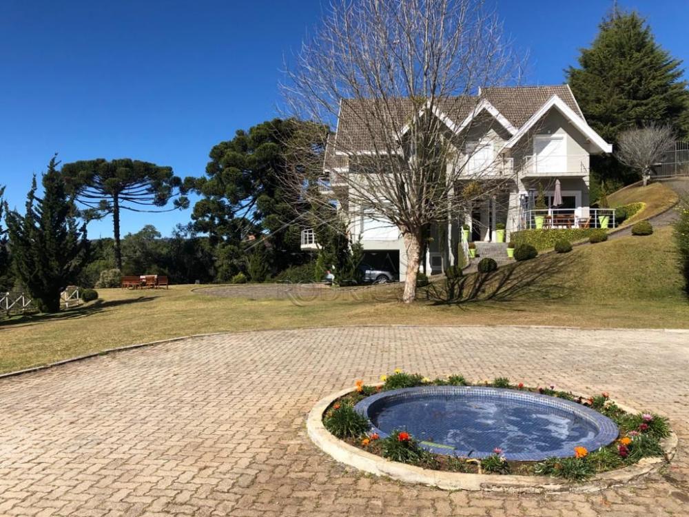 Casa à venda com 7 suítes no Recanto Araucária em Campos do Jordão/SP.