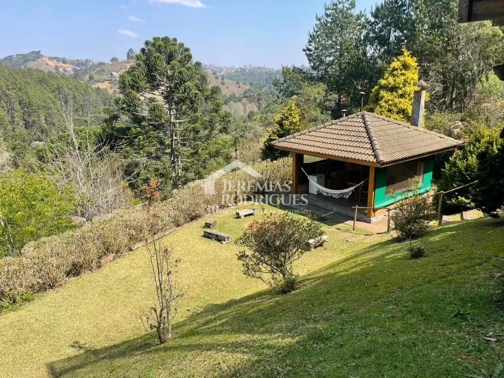 Casa com 3 suítes, 332 m² - Condomínio Florestal Clube - Campos do Jordão/SP.