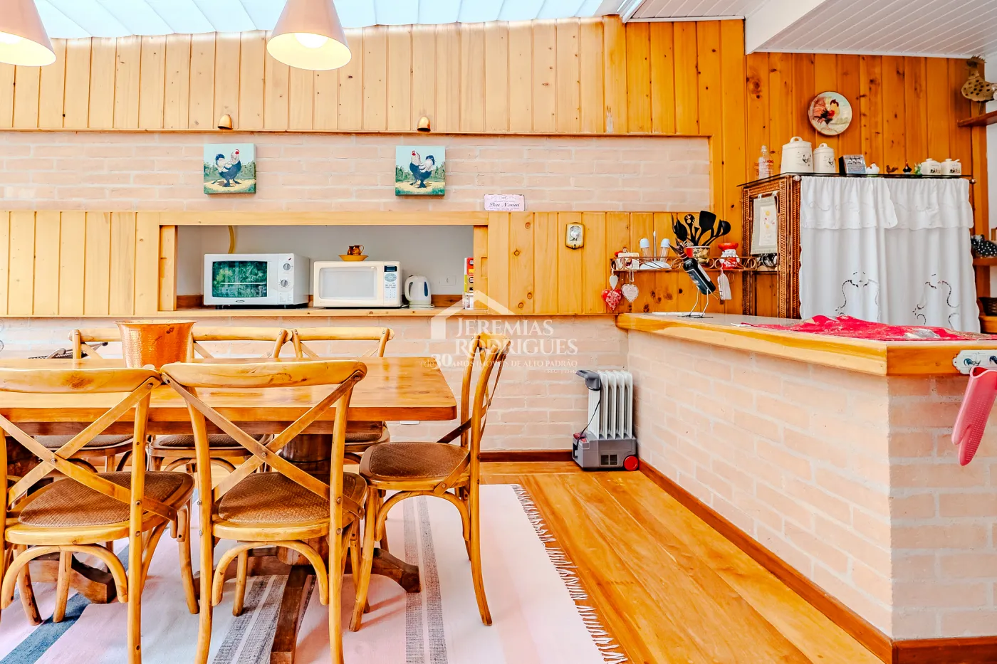 Casa com 6 suítes, 700 m² - Condomínio Vila Simonsen - Campos do Jordão/SP.