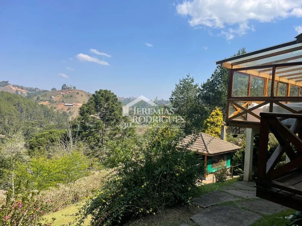 Casa com 3 suítes, 332 m² - Condomínio Florestal Clube - Campos do Jordão/SP.