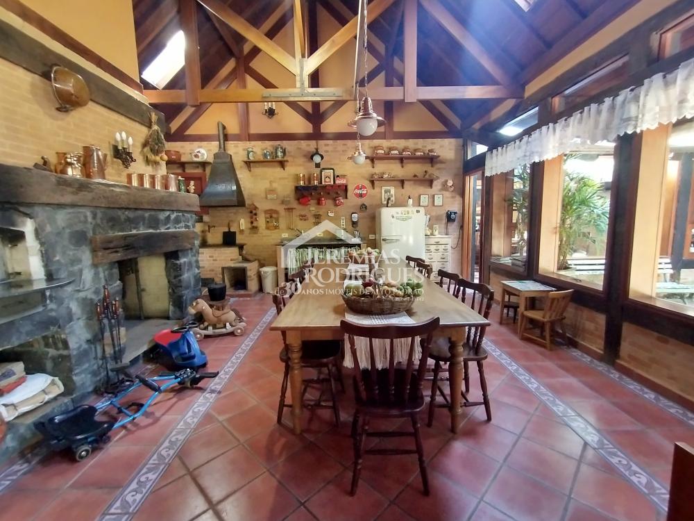 Casa com 6 dormitórios, 735 m² - Condomínio Jardim Véu da Noiva - Campos do Jordão/SP