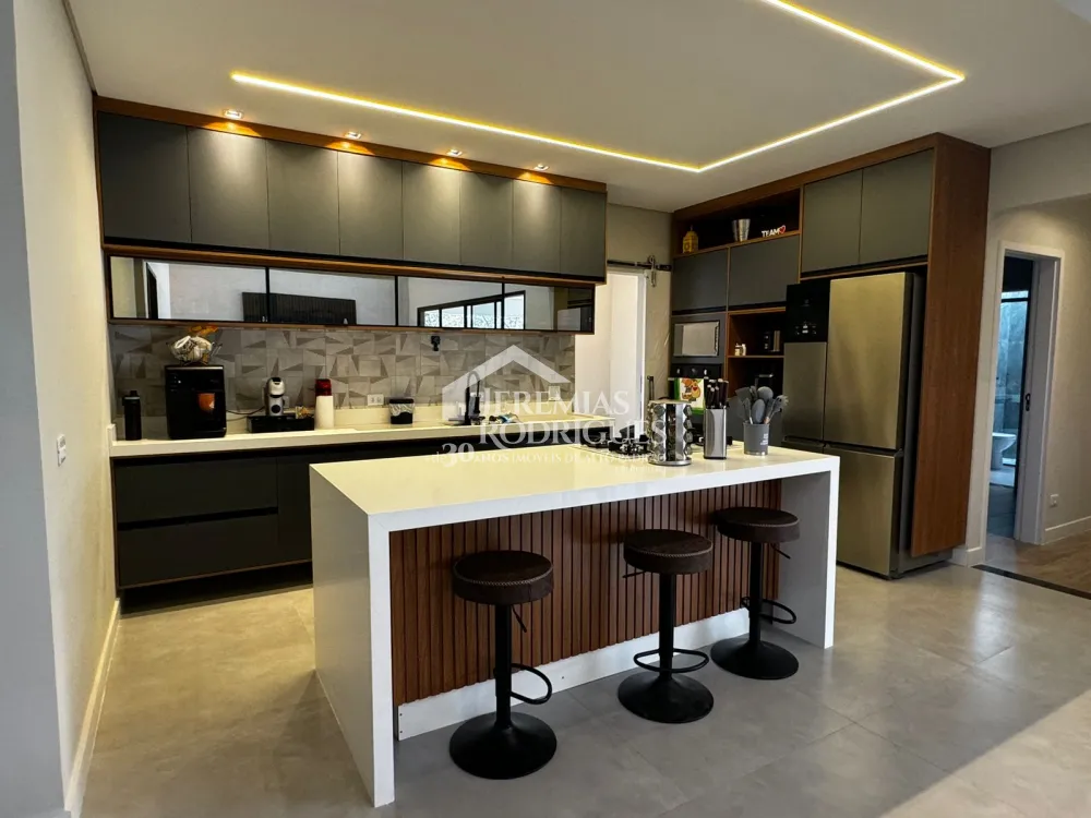 Casa com 4 suítes, 261 m² - Condomínio Altos do Cataguá - Taubaté/SP.