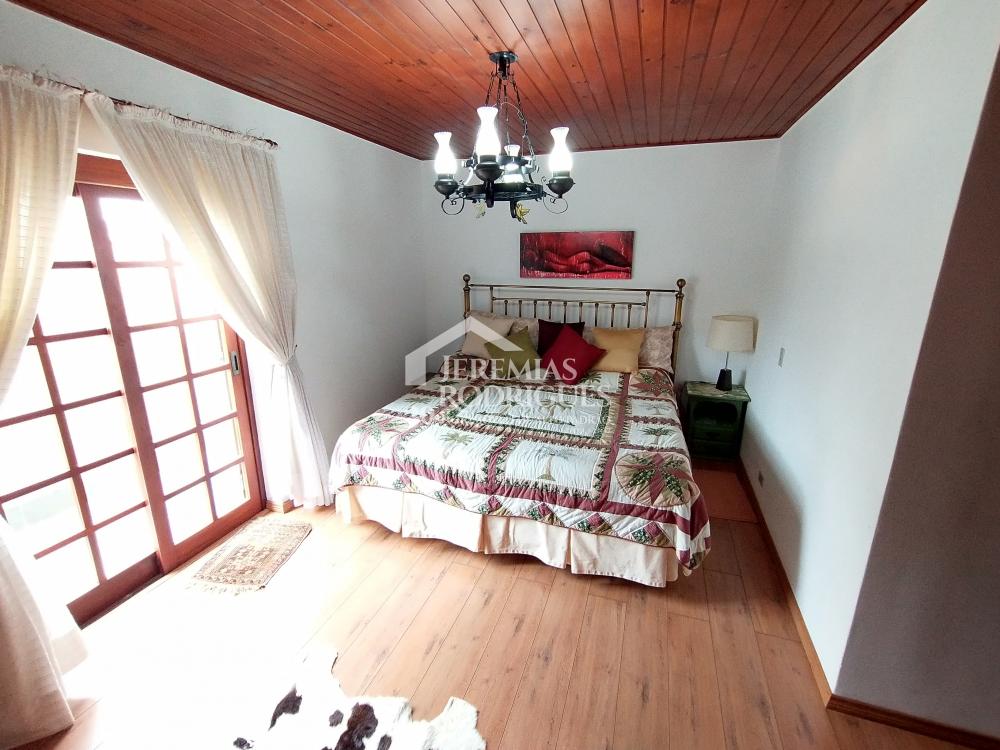 Casa com 4 dormitórios, 281 m² - Condomínio Jardim Véu da Noiva - Campos do Jordão/SP