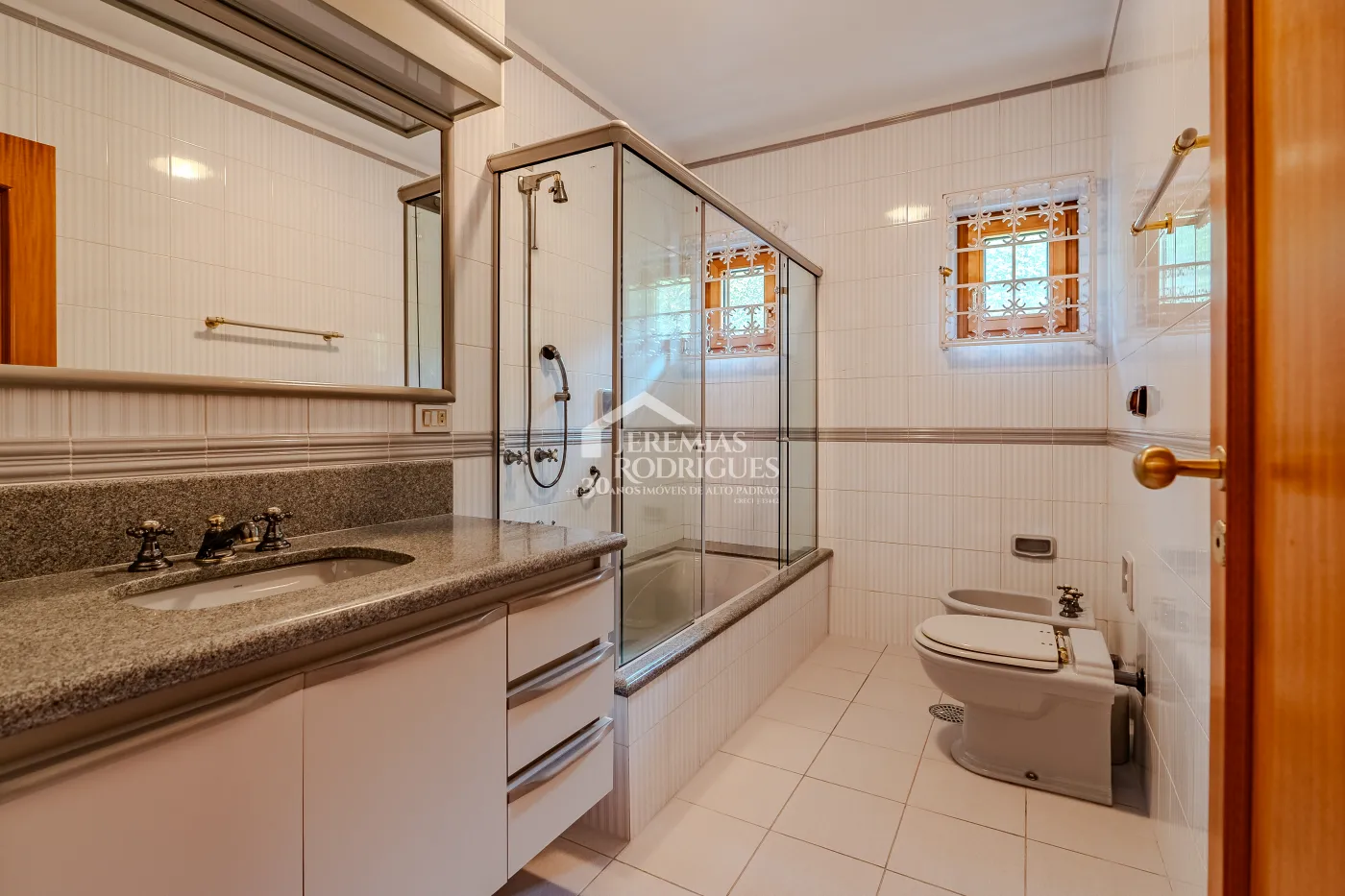 Casa com 4 suítes, 670 m² - Alto do Capivari - Campos do Jordão/SP.