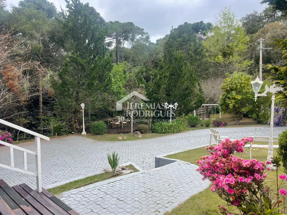 Casa com 6 dormitórios, 362 m² - Condomínio Iporanga, em Campos do Jordão/SP.