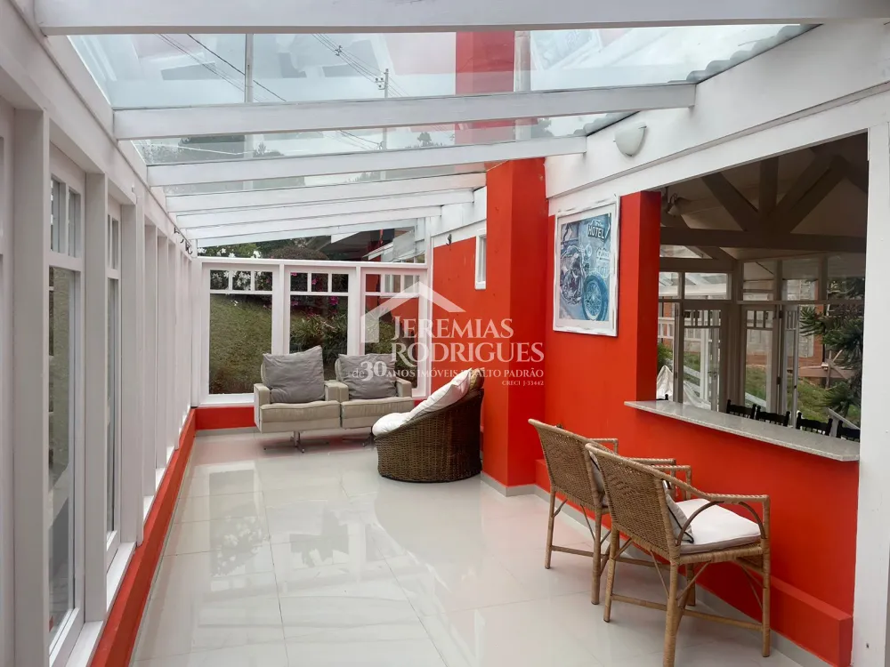 Casa com 6 dormitórios, 362 m² - Condomínio Iporanga, em Campos do Jordão/SP.