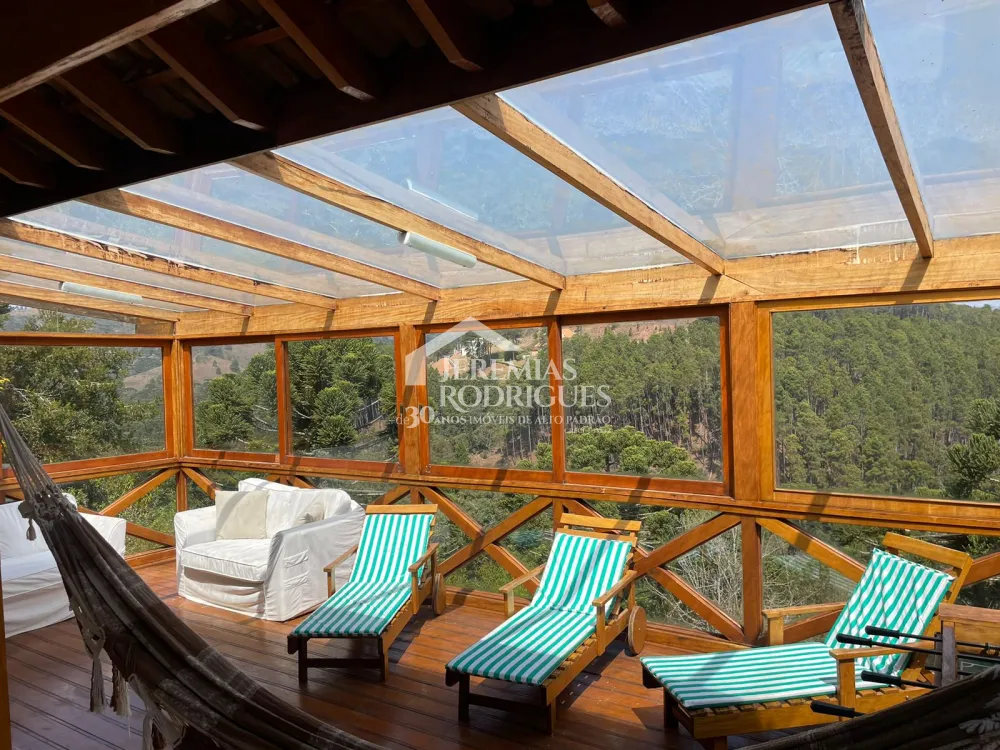 Casa com 3 suítes, 332 m² - Condomínio Florestal Clube - Campos do Jordão/SP.