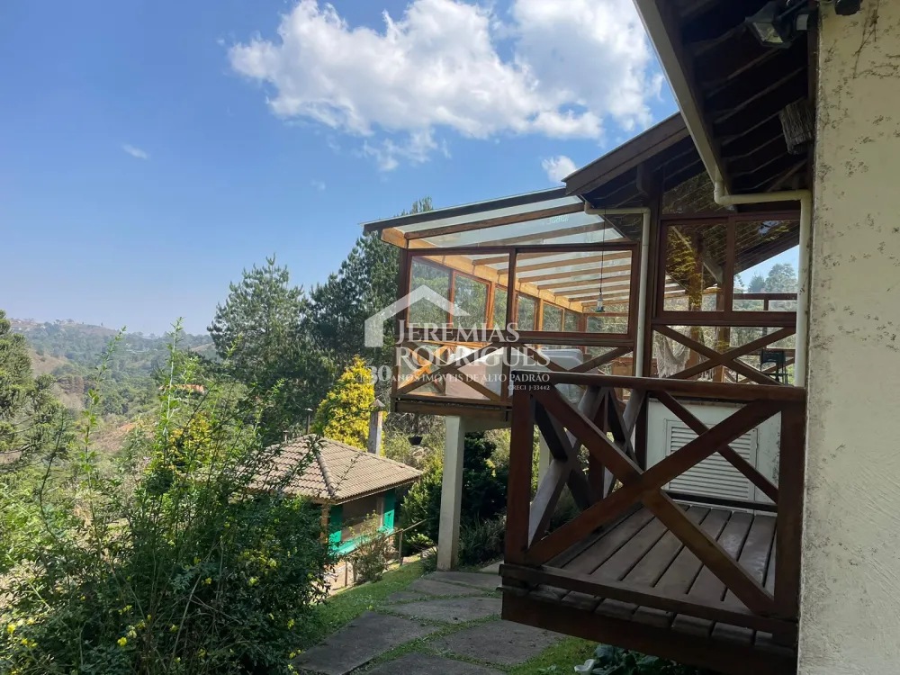 Casa com 3 suítes, 332 m² - Condomínio Florestal Clube - Campos do Jordão/SP.