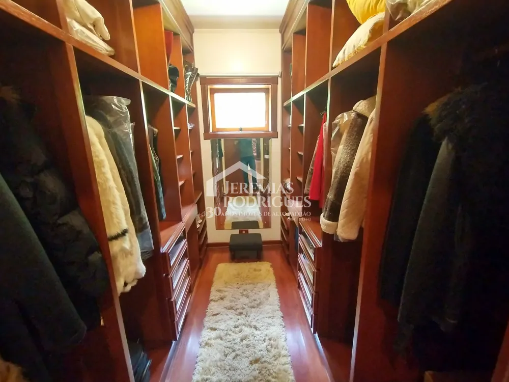 Casa com 4 dormitórios, 380 m² - Condomínio Jardim Véu da Noiva - Campos do Jordão/SP