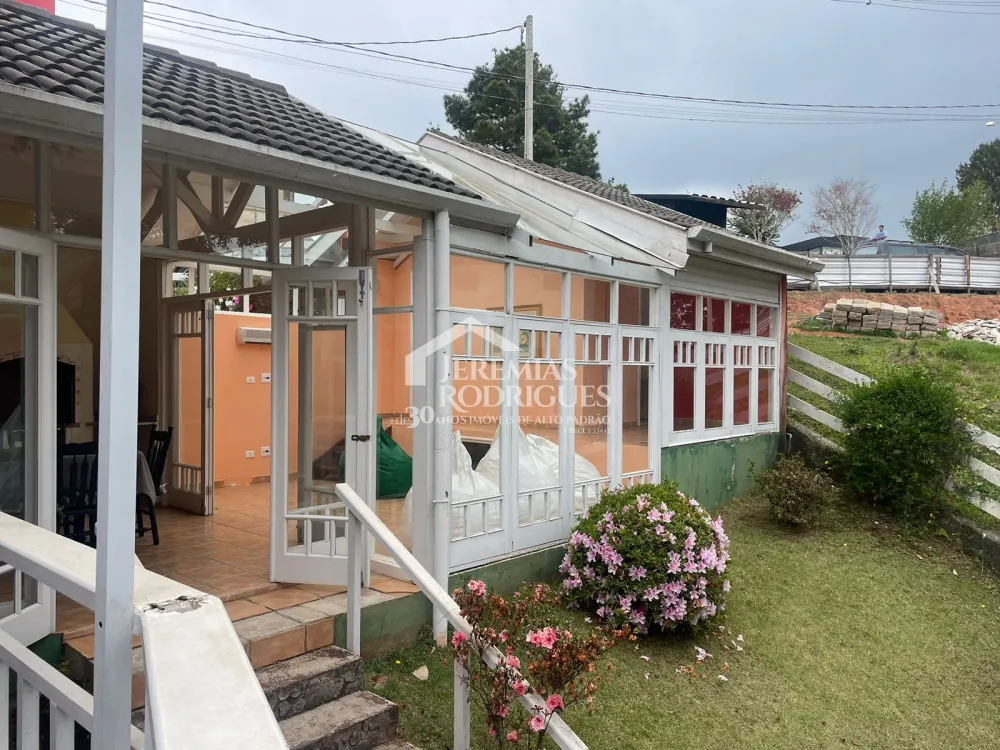 Casa com 6 dormitórios, 362 m² - Condomínio Iporanga, em Campos do Jordão/SP.