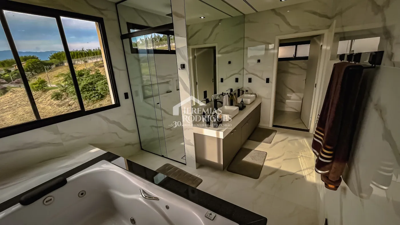 Casa com 3 suítes, 611 m² - Condomínio Village da Serra - Tremembé/SP