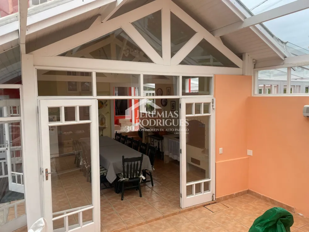 Casa com 6 dormitórios, 362 m² - Condomínio Iporanga, em Campos do Jordão/SP.