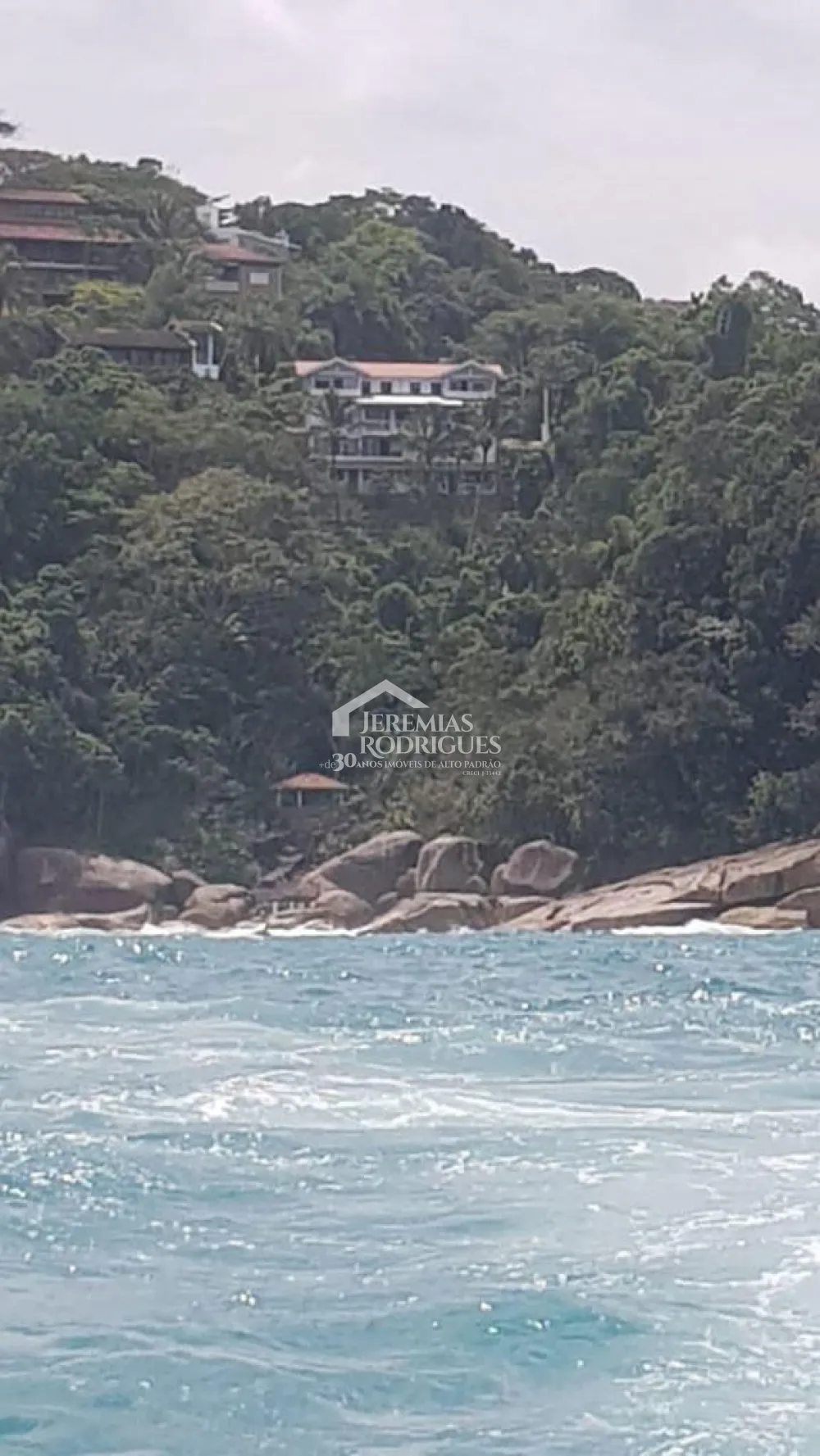 Casa com 5 suítes, 450 m² - Condomínio Ponta das Toninhas - Ubatuba/SP